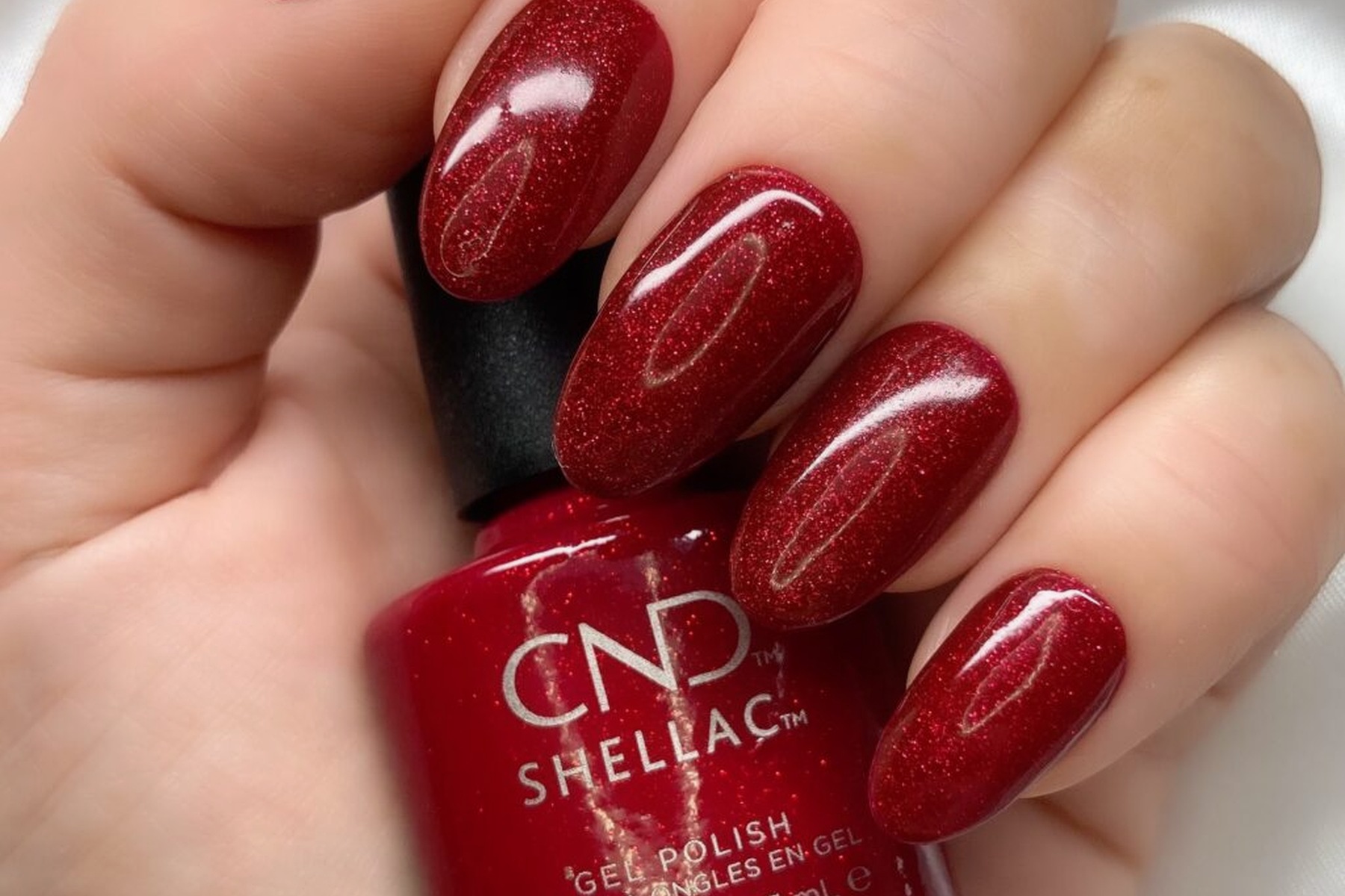 Glossy red CND Shellac manicure